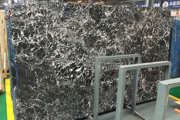big slab black marble with white design 
